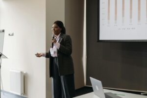 Businesswoman delivering an engaging presentation at a conference.